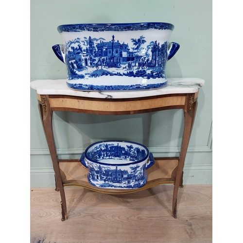 64 - Two blue and white ceramic foot baths with handles. {21 cm H x 48 cm W x 32 cm D} and {14 cm H x 34 ... 