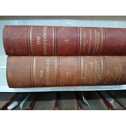 16 - Set of eleven Irish The Conveyancer leather bound books.  {H 25cm }.  NOT AVAILABLE TO VIEW IN PERSO... 