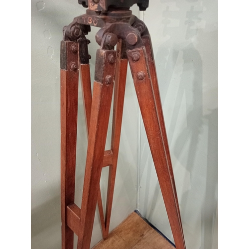 20 - 1900's brass Surveyor's theodolite mounted on an adjustable wooden tripod base. {168 cm H x 20 cm W ... 