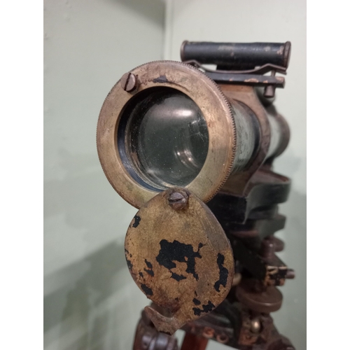 20 - 1900's brass Surveyor's theodolite mounted on an adjustable wooden tripod base. {168 cm H x 20 cm W ... 