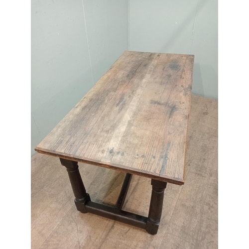 28 - Refectory table with fruitwood top on square turned legs and single stretcher. {H 86cm x W 174cm x D... 