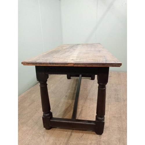 28 - Refectory table with fruitwood top on square turned legs and single stretcher. {H 86cm x W 174cm x D... 
