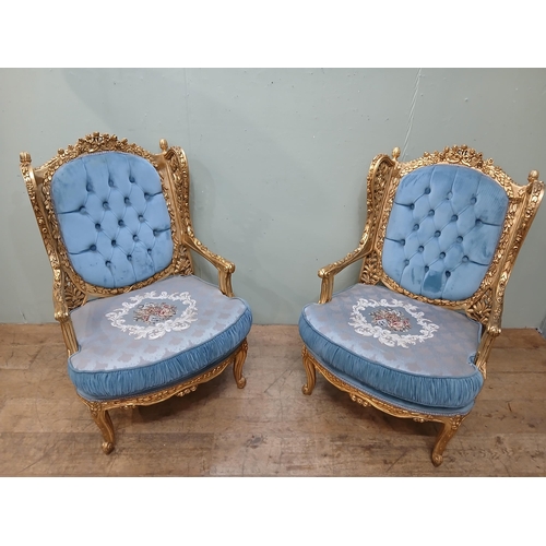 283 - Pair of French gilt armchairs with blue velvet upholstery.  {H 110cm x W 65cm x D 70cm }.  NOT AVAIL... 