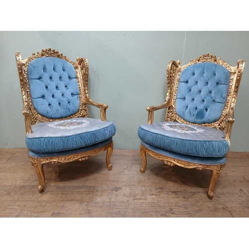 283 - Pair of French gilt armchairs with blue velvet upholstery.  {H 110cm x W 65cm x D 70cm }.  NOT AVAIL... 