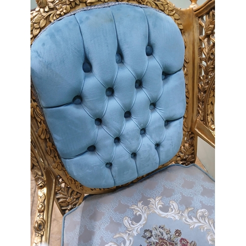 283 - Pair of French gilt armchairs with blue velvet upholstery.  {H 110cm x W 65cm x D 70cm }.  NOT AVAIL... 