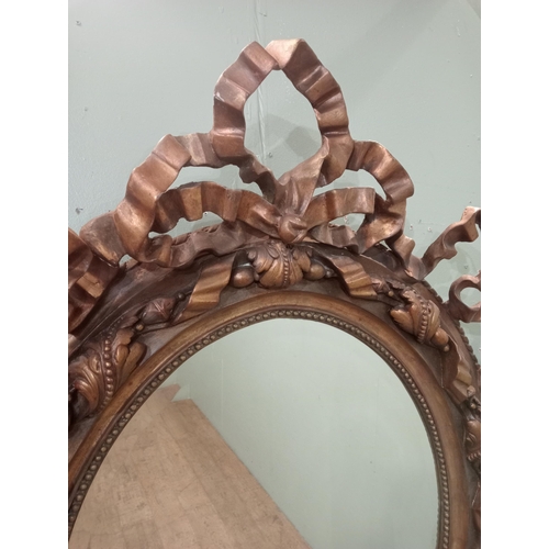 360 - Giltwood Rococo style oval wall mirror.  {H 115cm x W 84cm }.  NOT AVAILABLE TO VIEW IN PERSON.