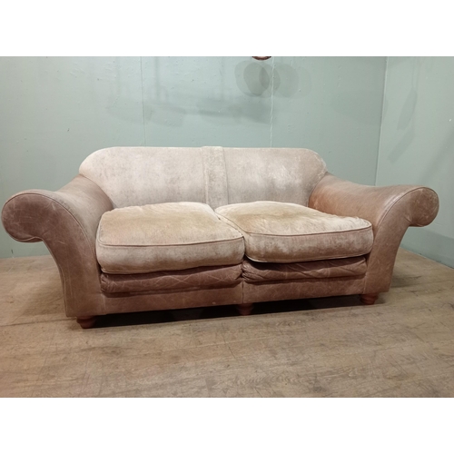 365 - Halo design two seater sofa with suede and leather upholstery on turned feet.  {H 80cm x W 195cm x D... 