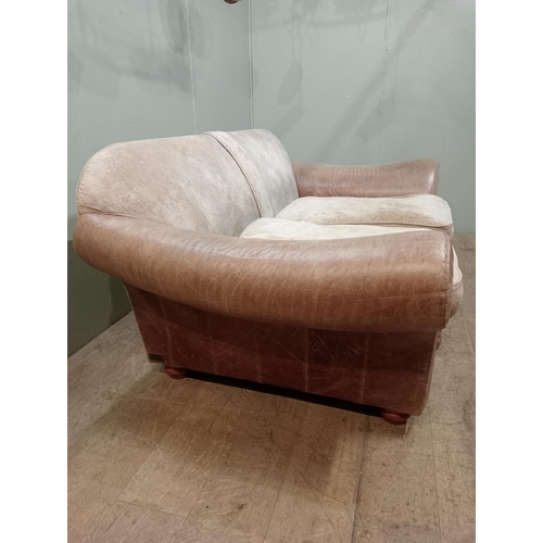 365 - Halo design two seater sofa with suede and leather upholstery on turned feet.  {H 80cm x W 195cm x D... 