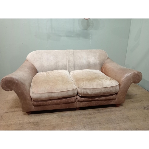 365 - Halo design two seater sofa with suede and leather upholstery on turned feet.  {H 80cm x W 195cm x D... 