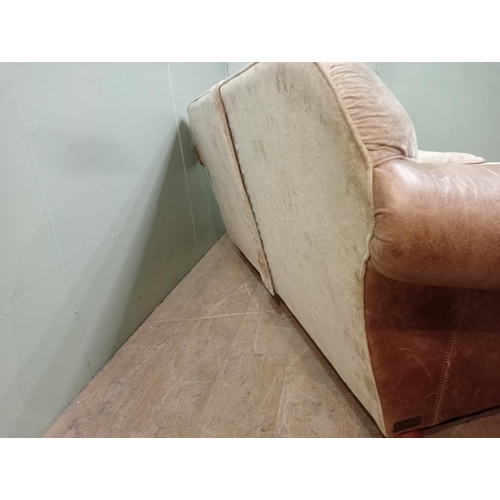 365 - Halo design two seater sofa with suede and leather upholstery on turned feet.  {H 80cm x W 195cm x D... 