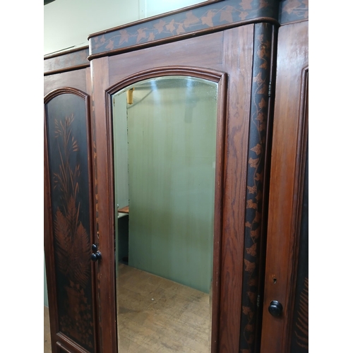 380 - Irish George III style triple fern ware wardrobe flanked by two doors with internal brass clothes ra... 