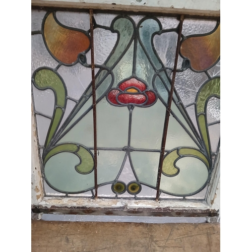 450 - Leaded stained glass window with central red flower and yellow and orange fruit.   {H 83cm x W 73cm ... 