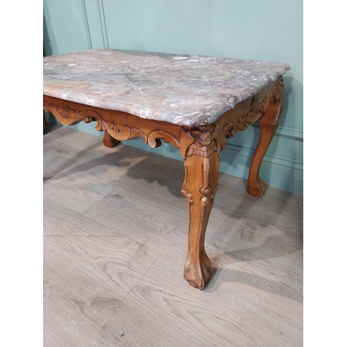 11 - Good quality carved walnut coffee table with marble top. {50 cm H x 92 cm W x 62 cm D}.