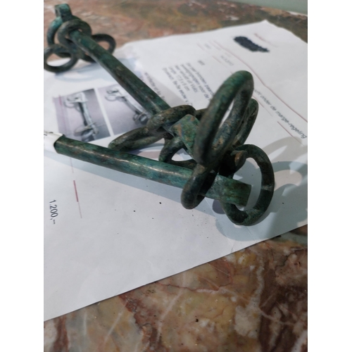 5 - Unusual bronze Horse bits. {16 cm H L}.