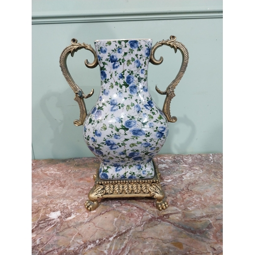 8 - Pair of decorative ceramic urns with handles. {43 cm H x 34 cm W x 20 cm D}