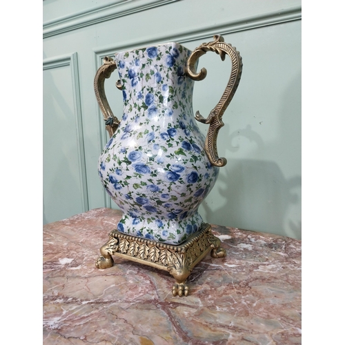 8 - Pair of decorative ceramic urns with handles. {43 cm H x 34 cm W x 20 cm D}