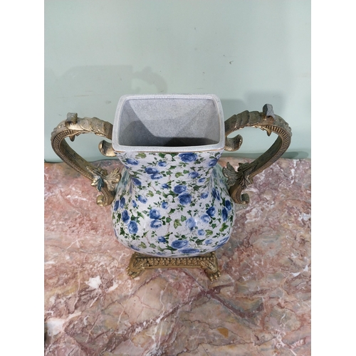 8 - Pair of decorative ceramic urns with handles. {43 cm H x 34 cm W x 20 cm D}