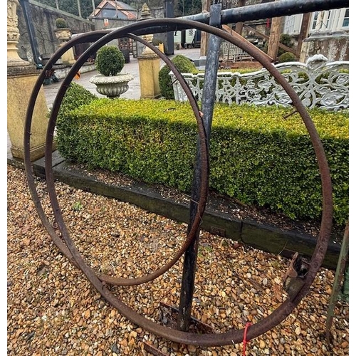 Pair of wrought iron cart wheel rims. {125 cm Dia.}.