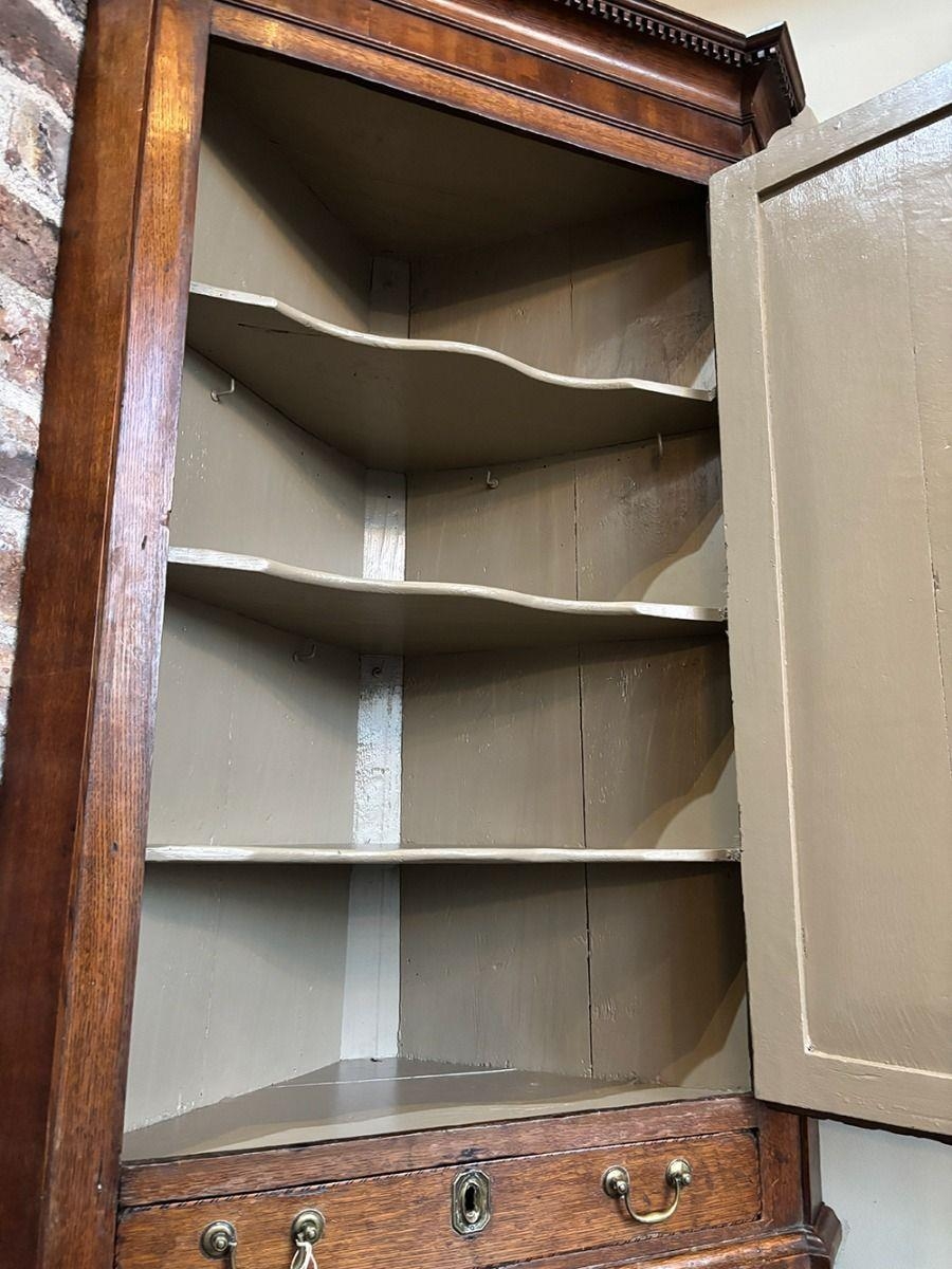 Georgian oak and satinwood inlay corner cupboard with moulded cornice ...