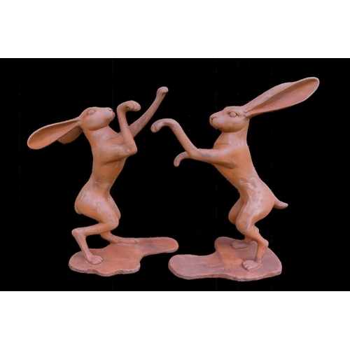 188 - Pair of cast iron boxing Hares. {89 cm H x 84 cm W}. NOT ON SITE FOR VIEWING