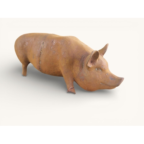 53 - Large cast iron model of Pig. {30 cm H x 68 cm W x 25 cm D}.