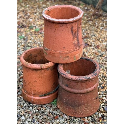 54 - Set of four Edwardian terracotta chimney pots.  {28 cm H x 28 cm Dia.}.