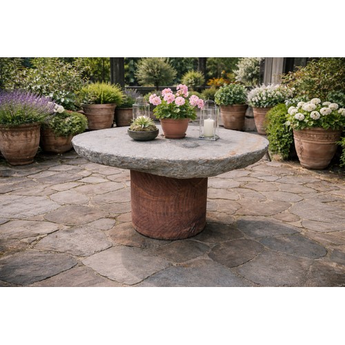 36 - Limestone mill wheel garden table on sandstone pedestal. {70 cm H x 118 cm Dia.}. NOT ON SITE FOR VI... 