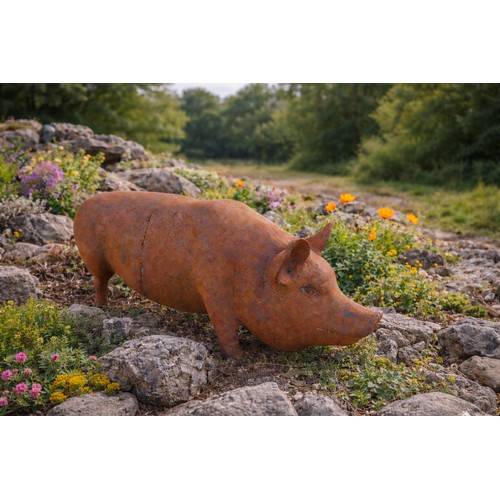 53 - Large cast iron model of Pig. {30 cm H x 68 cm W x 25 cm D}.