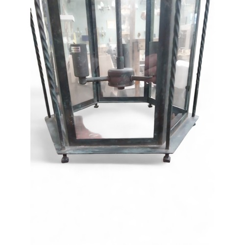 18 - Good quality bronzed metal Gothic hanging lantern. {80 cm H x 40 cm Dia. with chain drop of 100 cm }... 
