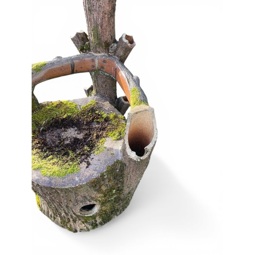 Ceramic tree trunk chair {110cm H x 87cm W x 74cm D}