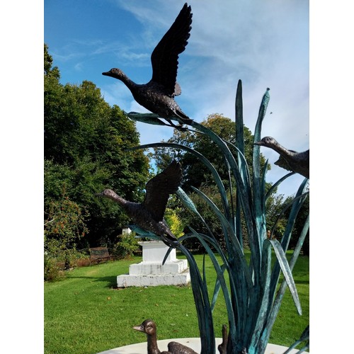 27 - Good quality bronze sculpture of Ducks flying in Bullrushes. { 90cm H X 70cm W X 62cm D }.