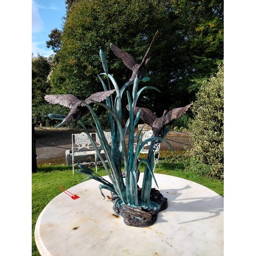 27 - Good quality bronze sculpture of Ducks flying in Bullrushes. { 90cm H X 70cm W X 62cm D }.