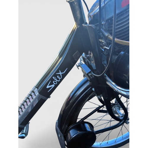 30 - 1970's Solex powered bicycle. PWO. { 96cm H x 160cm L x 54cm D }.  NOT ON SITE FOR VIEWING