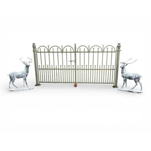 36A - Pair of good quality cast iron stags with lead effect on plinths {140cm H x 120cm W x 75cm D}