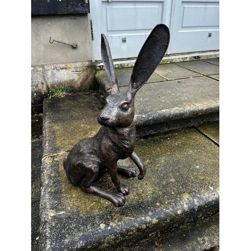 45A - Exceptional quality bronze statue of a seated Hare with ears up {61 cm H x 35 cm W x 20 cm D}.