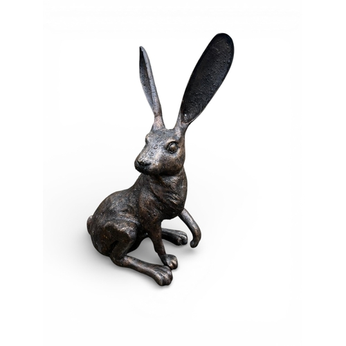 45A - Exceptional quality bronze statue of a seated Hare with ears up {61 cm H x 35 cm W x 20 cm D}.