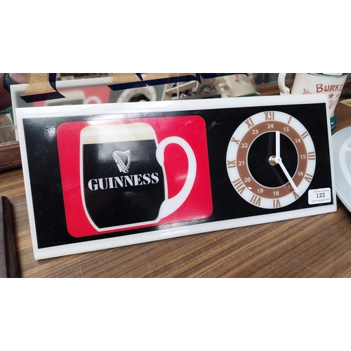 Guinness perspex light up shelf clock. {18 cm H x 41 cm W}.