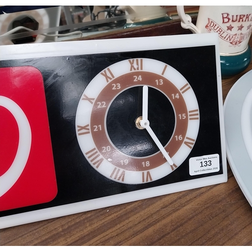 Guinness perspex light up shelf clock. {18 cm H x 41 cm W}.