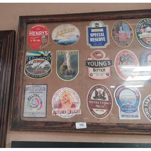 158 - Framed montage of beer mats. {49 cm H x 64 cm W}.