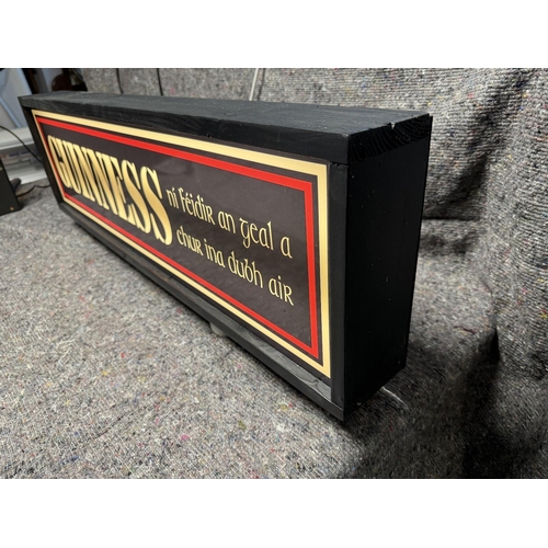 165A - Wooden case Guinness bilingual advertising light up box. {26 cm H x 90 cm W x 10 cm D}.