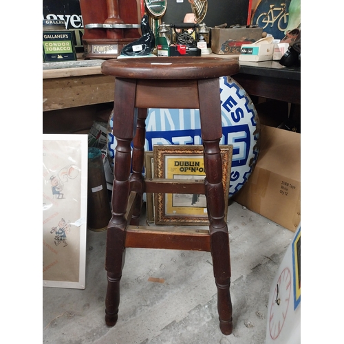 270 - 1970's mahogany and brass bar stool. {73 cm H x 32 cm W x 32 cm D}.