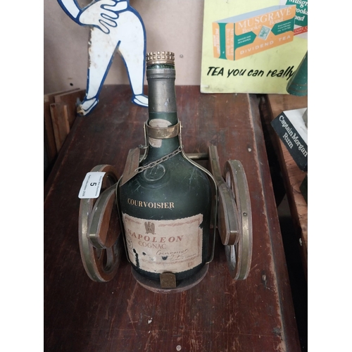 5 - Napoleon Brandy advertising model of bottle in Cannon. {27 cm H x 18 cm W x 24 cm D}.
