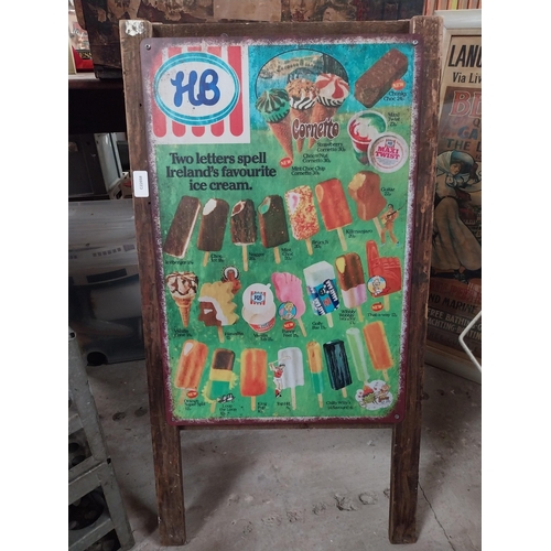 576 - Two tin  plate HB Ice Cream advertising signs mounted on wooden sandwich board. {90 cm H x 46 cm W}.