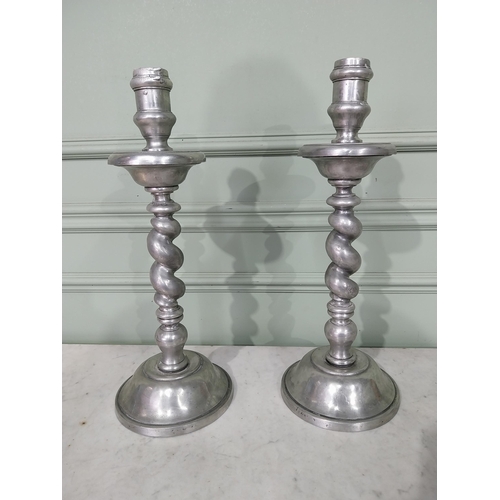 12 - Pair of pewter barley twist candlesticks. {45 cm H x 17 cm Dia.}.