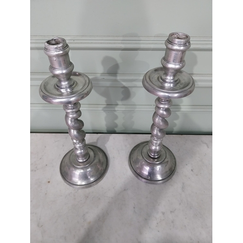 12 - Pair of pewter barley twist candlesticks. {45 cm H x 17 cm Dia.}.