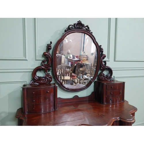 14 - Victorian mahogany Duchess dressing table with mirrored back flanked by six drawers over short drawe... 