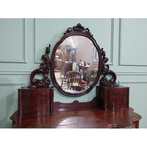 14 - Victorian mahogany Duchess dressing table with mirrored back flanked by six drawers over short drawe... 