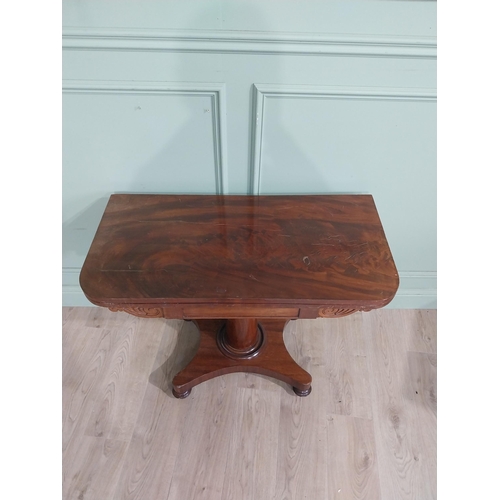 48 - William IV mahogany turn over leaf card table with turned column on plinth base. {72 cm H x 91 cm W ... 