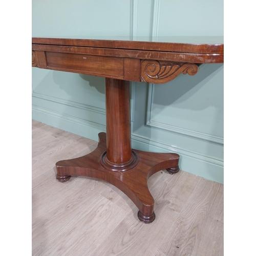 48 - William IV mahogany turn over leaf card table with turned column on plinth base. {72 cm H x 91 cm W ... 