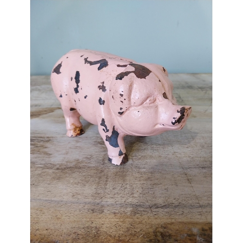 39 - Painted cast iron Piggy Bank. {12 cm H x 20 cm W x 10 cm D}.
